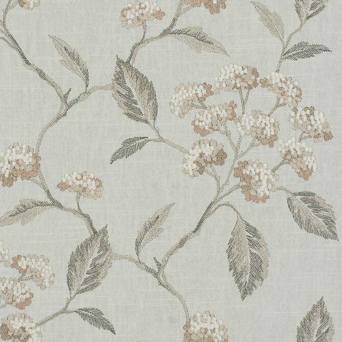 detail of embroidered floral fabric in grey and white