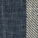 detail of striped upholstery fabric in indigo colour way