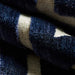 detail of velvet upholstery fabric in indigo colour way