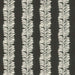 embroidered fabric in charcoal and cream of leaves in stripe pattern