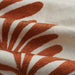 detail of embroidered fabric in clay and cream of leaves in stripe pattern