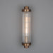 Retro Bathroom wall light fixture in Antique Brass on a grey background