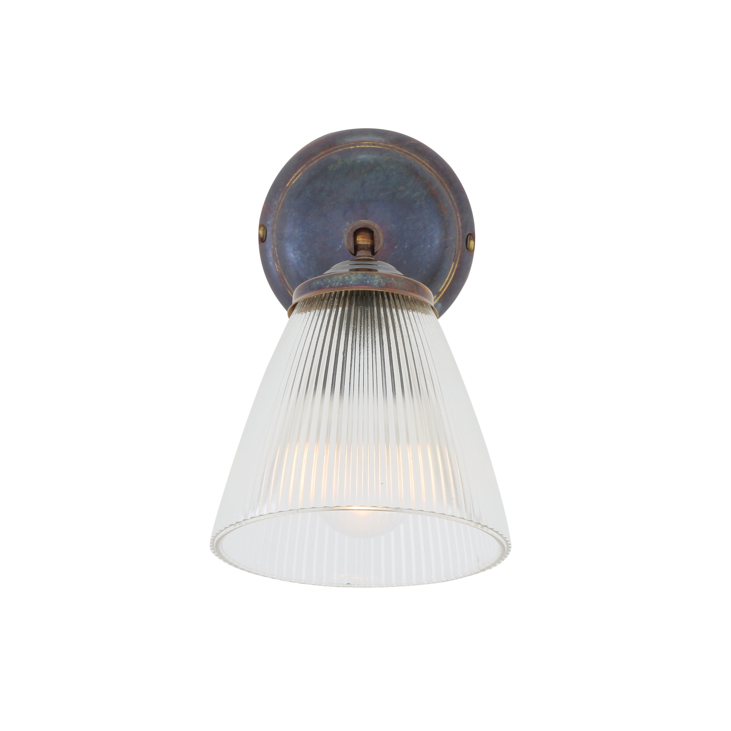 Wall-mounted light fixture in antique brass with prismatic glass shade on a white background