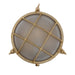 Round metallic light fixture with grid design on a white background