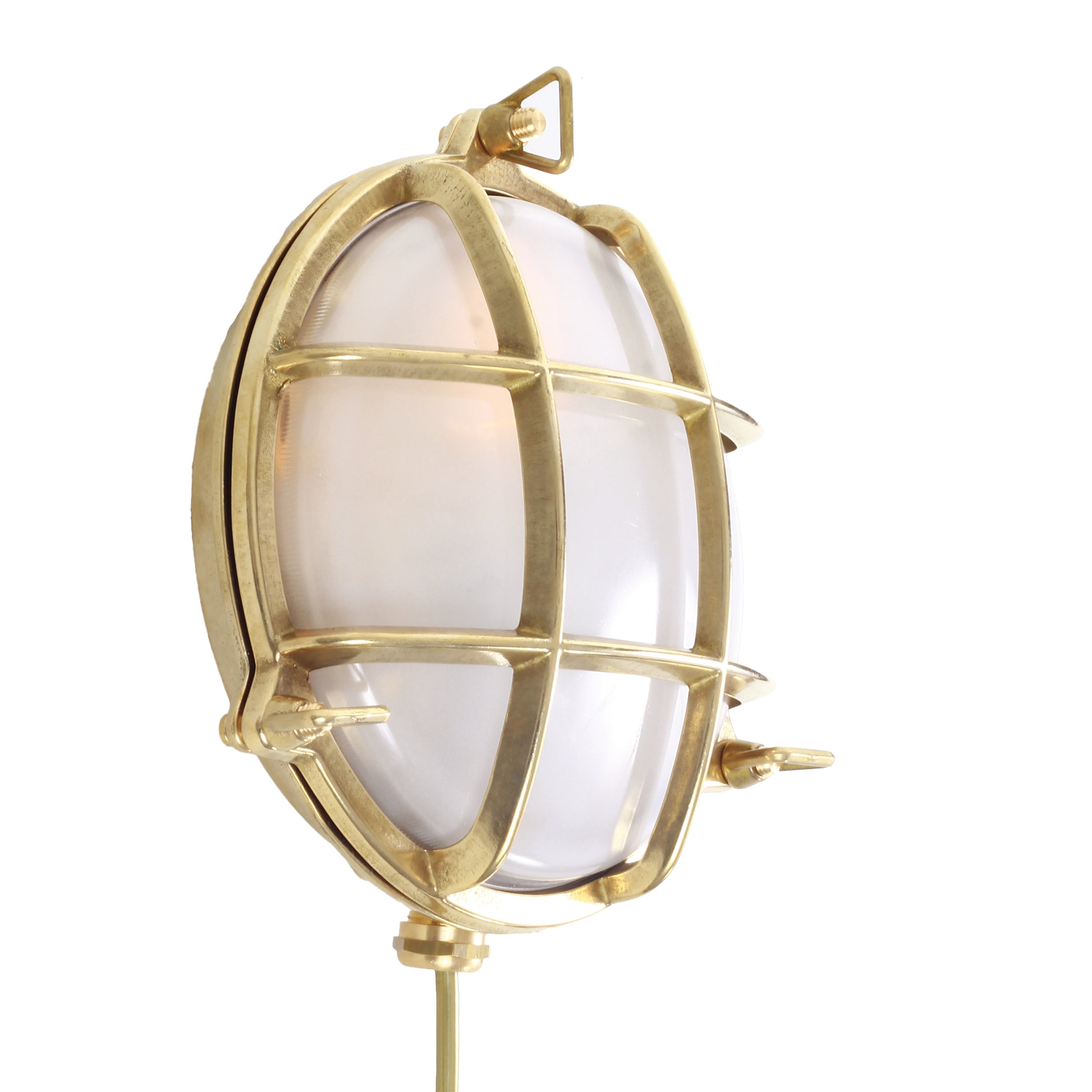 Round brass light fixture with grid design on a white background - side view