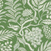 Botanical pattern with leaves and flowers on a green background
