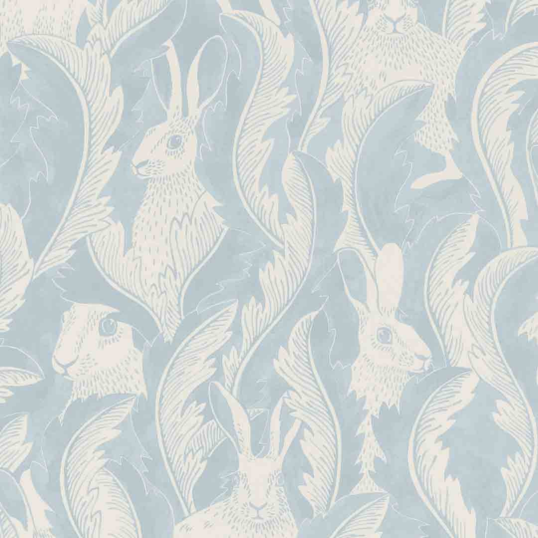 Wallpaper design pf hares hiding in leaves  in denim blue