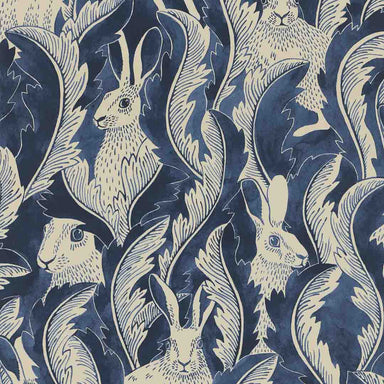 Patterned fabric with white hares and leaves on a blue background