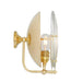 Polished brass wall sconce with glass shades on a white background