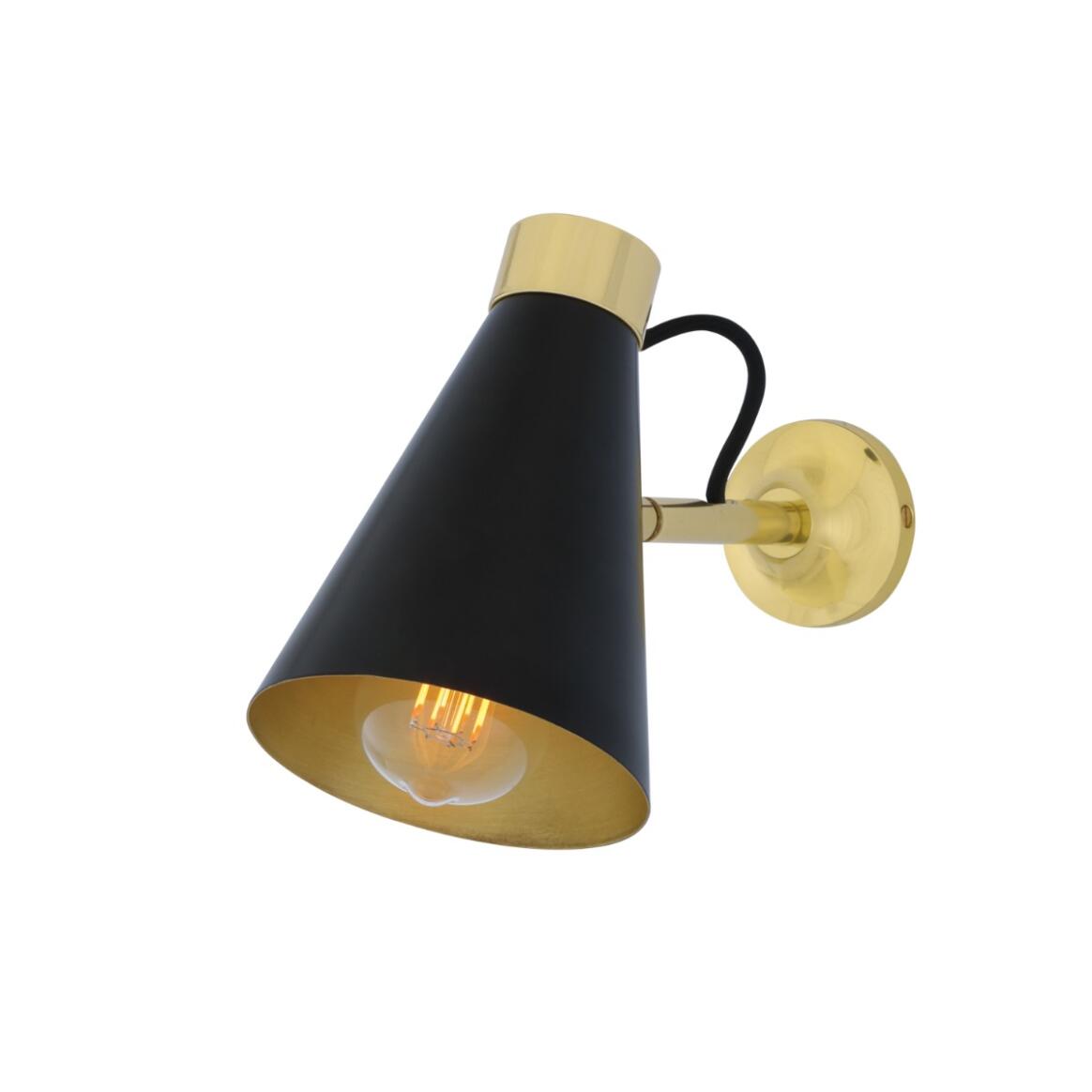Wall-mounted light fixture with black cone shade and brass accents on a white background