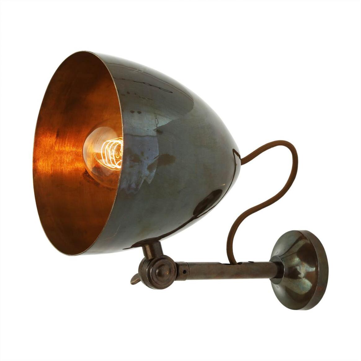 Wall-mounted lamp in antique brass on a white background