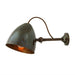 Wall-mounted lamp in antique brass on a white background