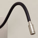 Brushed nickel and black leather LED reading wall light with goose net arm detail
