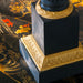 Bronze and gilt column lamp detail