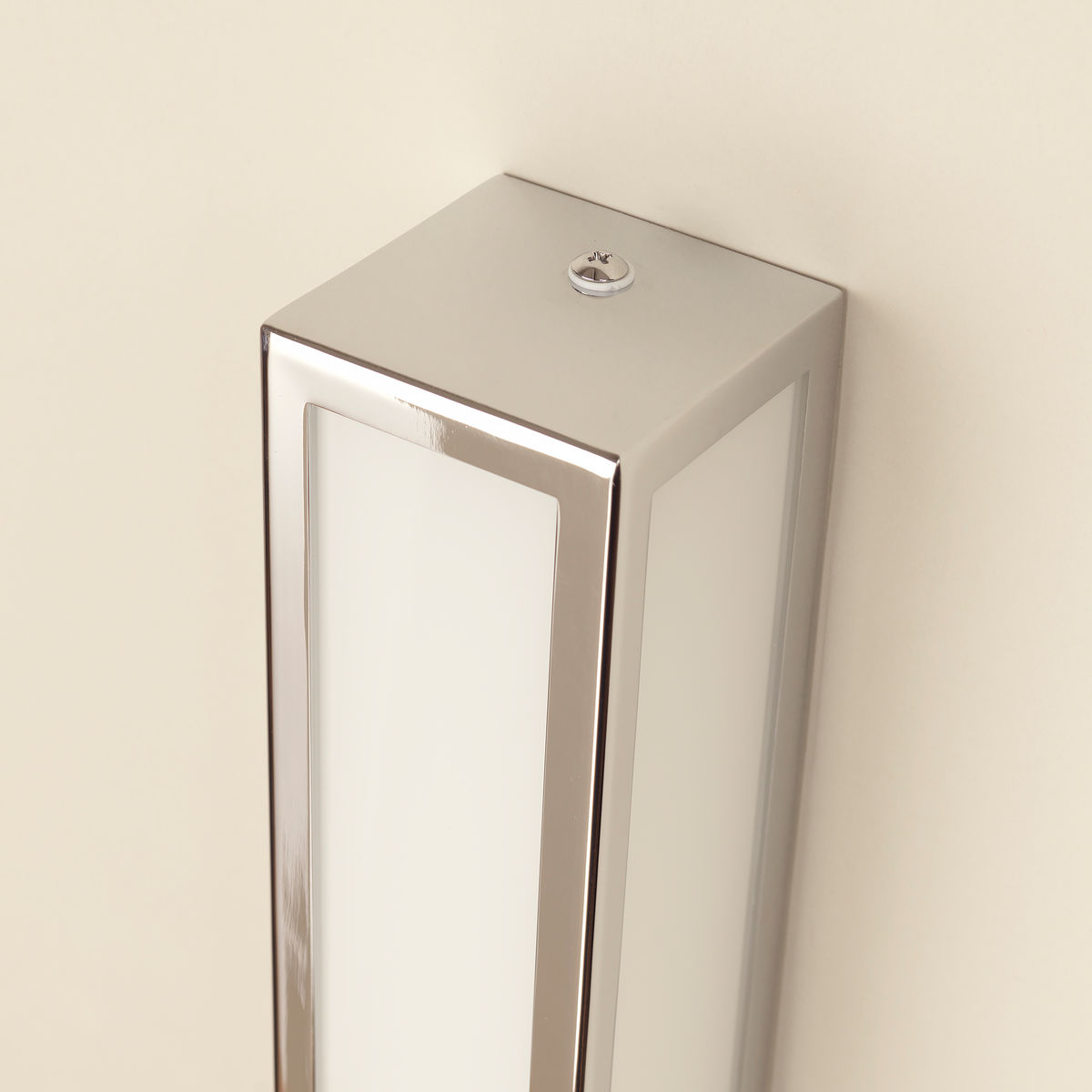 Bathroom chrome wall light with opaque diffuser detail
