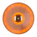 A top-down view of a circular amber-orange light fixture or lamp shade with a glowing warm light and a dark central core, isolated on a white background.