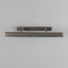 Metallic wall-mounted light fixture on a gray background