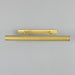 Brass metal handle on a grey background