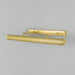 Brass wall-mounted light fixture on a grey background