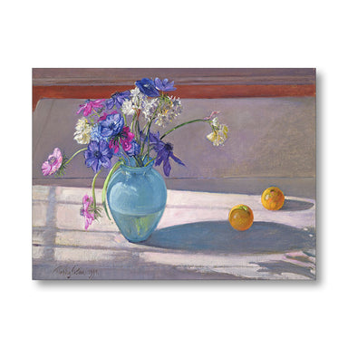 Still life painting of a blue vase with flowers and oranges on a wooden surface