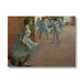 Framed artwork of dancers in a ballet studio by Edgar Degas