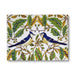 A square decorative art print or panel featuring two bluebirds perched among green and gold-toned leaves on a white background, shown against a light gray studio backdrop.