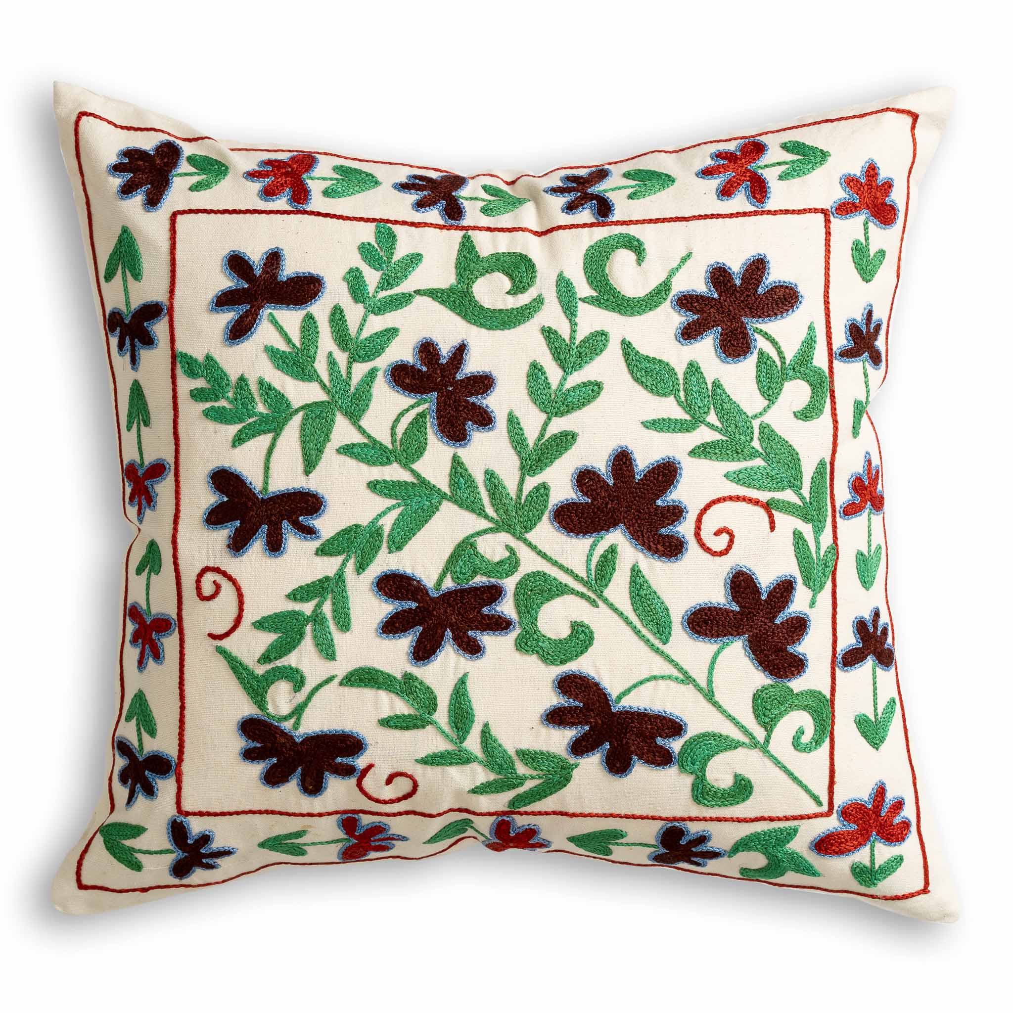 Suzani Silk Embroidered Stylised Floral Patterned Scatter Cushion on cream background with green leaves and red and burgundy coloured flowers